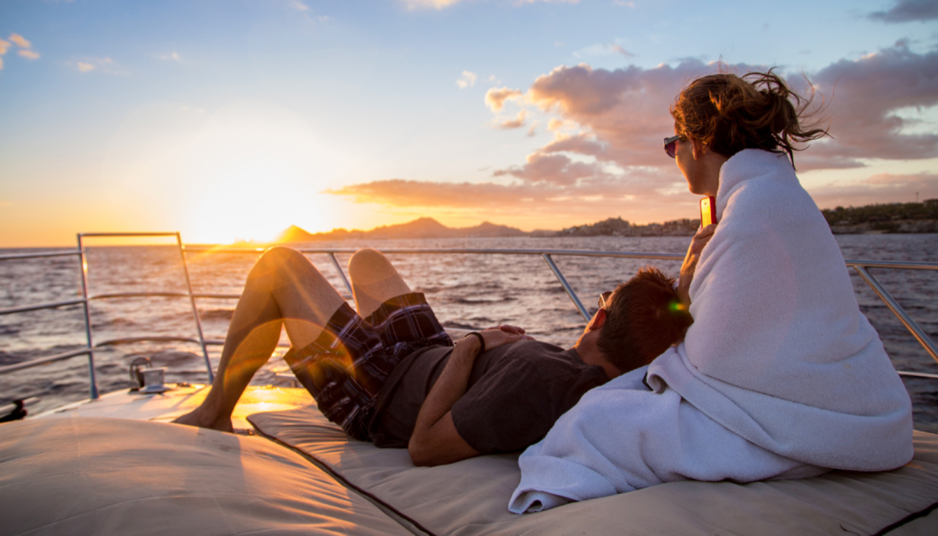 Romantic dinner on yacht at sunset