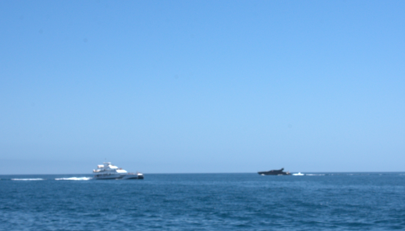 Luxury yacht charter cruising the Pacific coastline near Ensenada Baja California Mexico