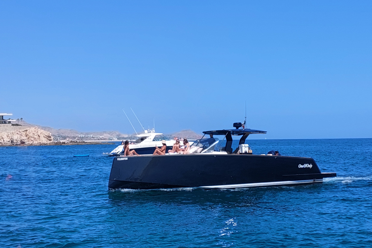 Luxury yacht charter guests enjoying private day trip on Sea of Cortez Cabo San Lucas