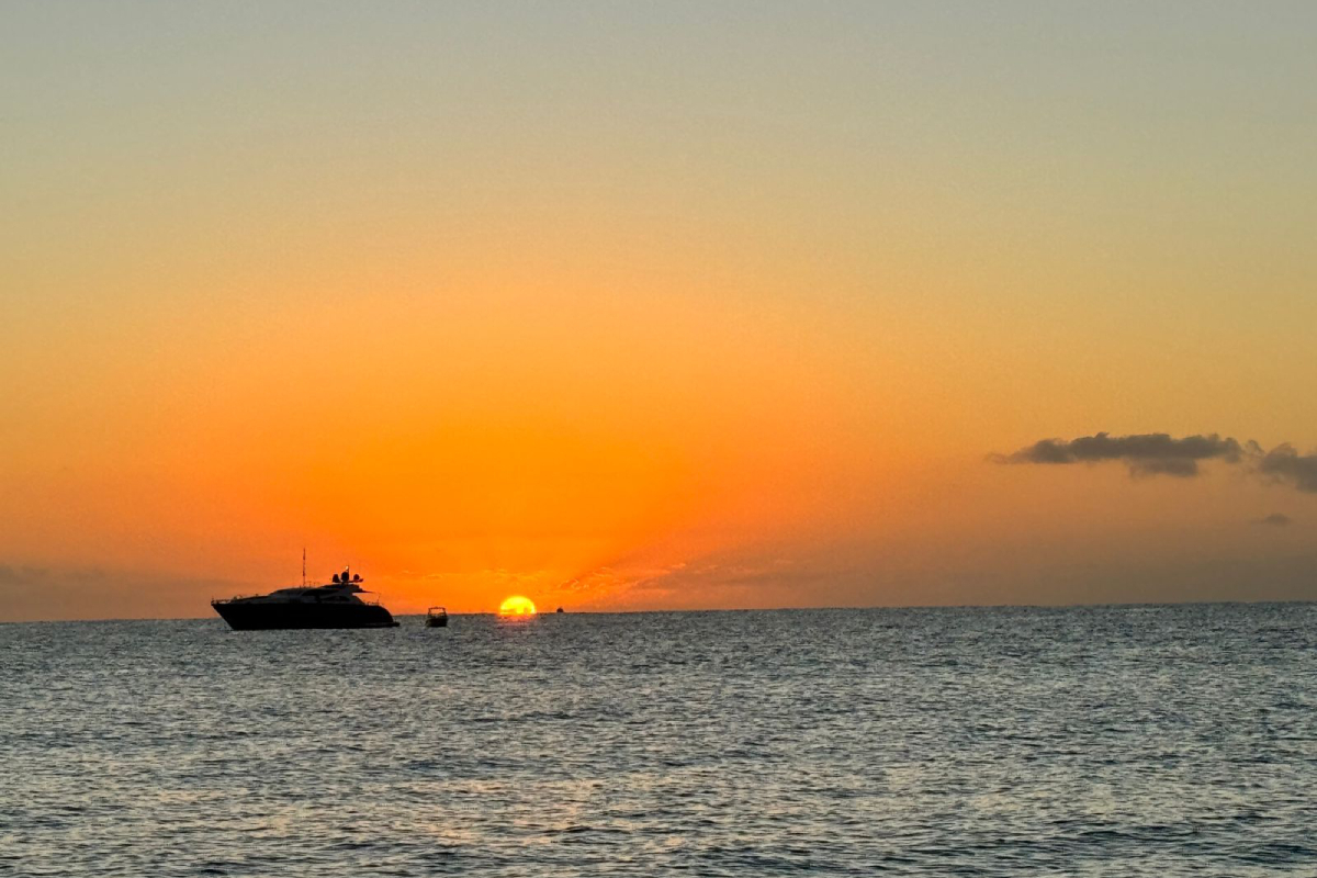Sunset cruise champagne toast on luxury yacht Sea of Cortez golden hour Cabo San Lucas